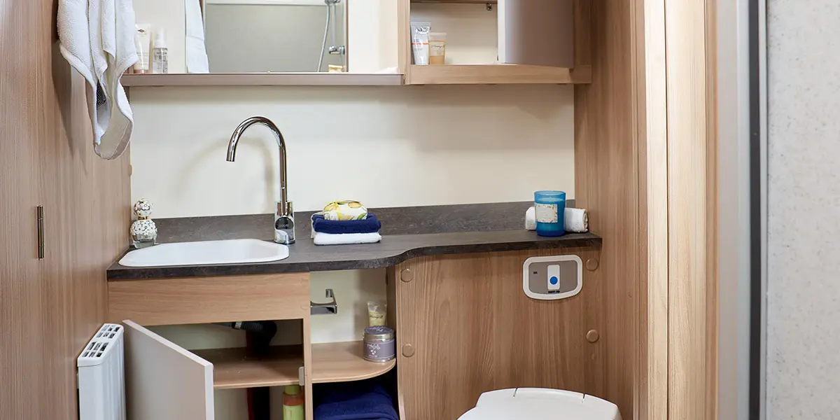 Alicanto Grande Porto bathroom with countertop inset washroom hand basin and swan neck tap