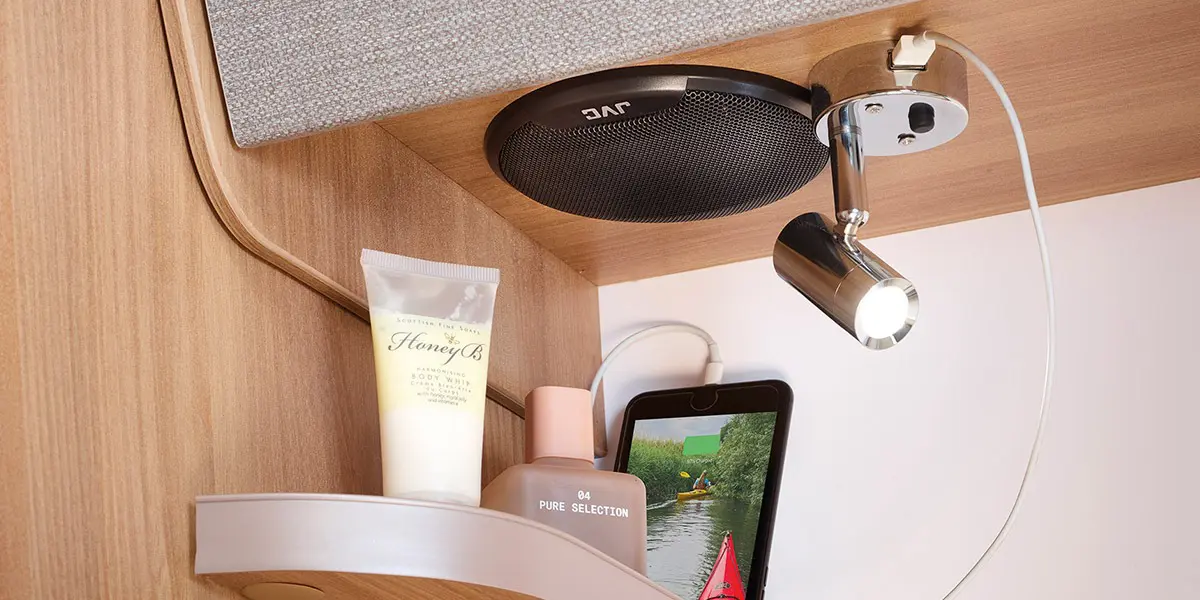 Autograph 74-4 12v directional spotlights with integral USB sockets in rear bedroom