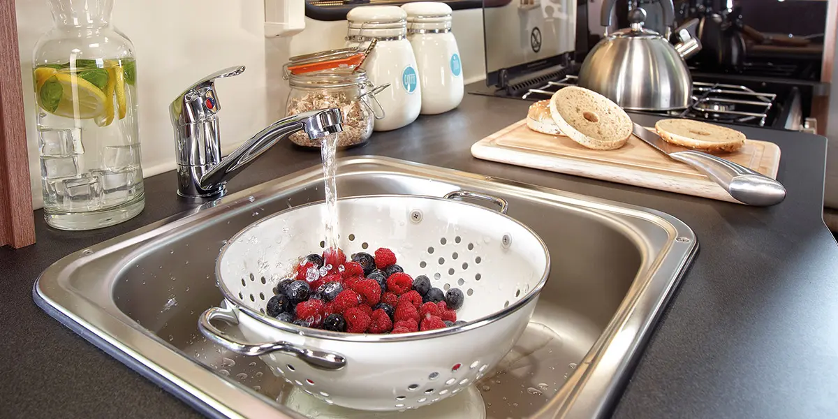 Stainless steel square kitchen sink with mixer tap, washing up bowl, drainer and chopping board (all models)