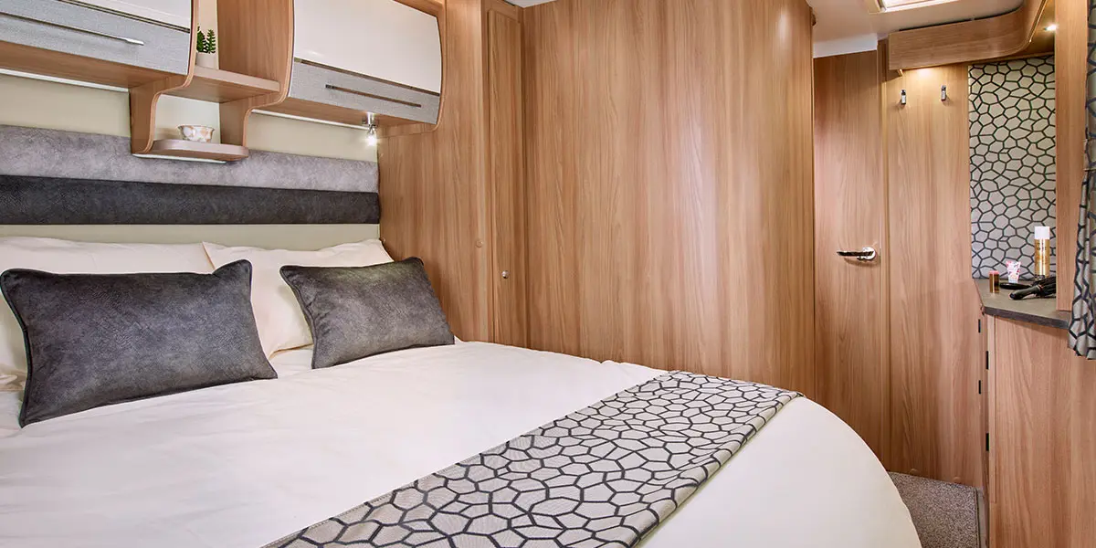 Alicanto Grande Faro bedroom with full width padded headboard