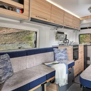 The inside front lounge and kitchen of a Bailey Endeavour B62, one of our suggest campervans in our how to campervan around the UK guide