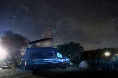 A Bailey Endeavour parked up at night looking up at the stars