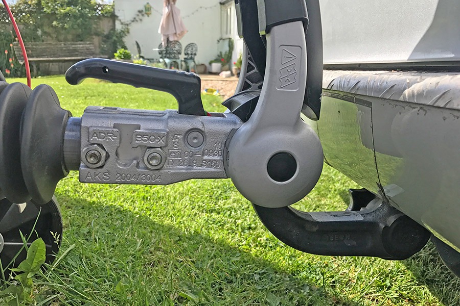 Lower the hitch onto the tow ball