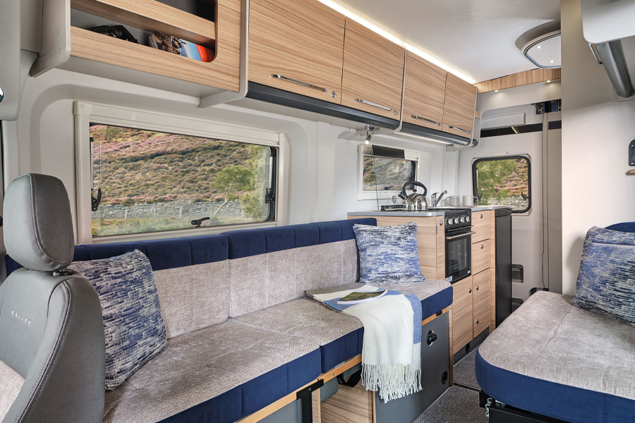 The inside front lounge and kitchen of a Bailey Endeavour B62, one of our suggest campervans in our how to campervan around the UK guide