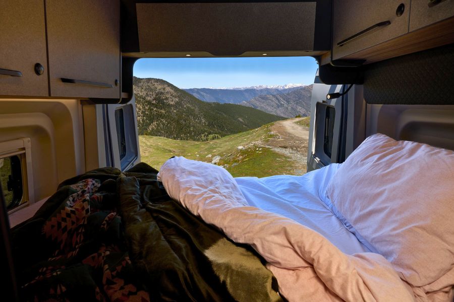Interior view from the Endurance bed looking out over a mountain landscape.