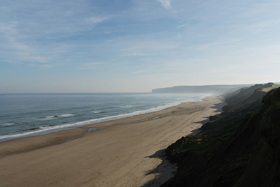A beach in Filey, UK. Photo by Al Elmes on Unsplash