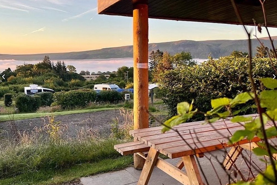 A view over The Quiet Site Courtesy of: https://thequietsite.co.uk/accommodation/gingerbread-houses/