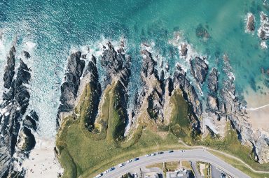 An aerial view of the Devon coast: Photo by Peter Ford on Unsplash