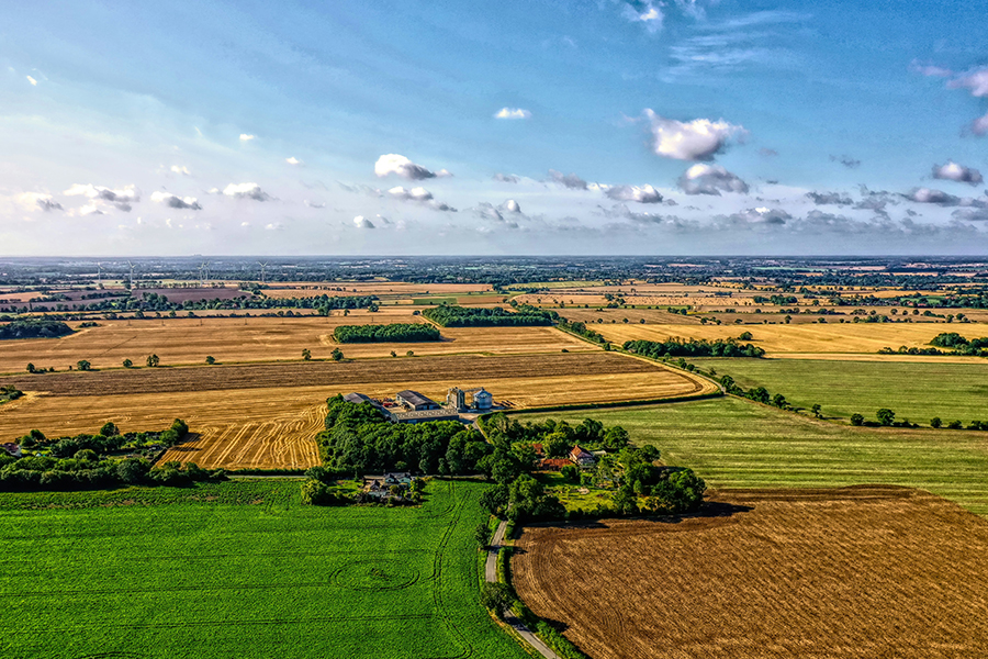A drone shot over the Suffolk countryside: Photo by Niklas Weiss on Unsplash