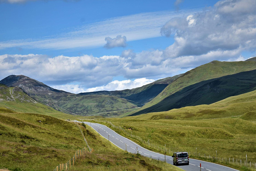 A road through the Cairngorms National Park in Scotland. Photo by Léonie Lejon on Unsplash
